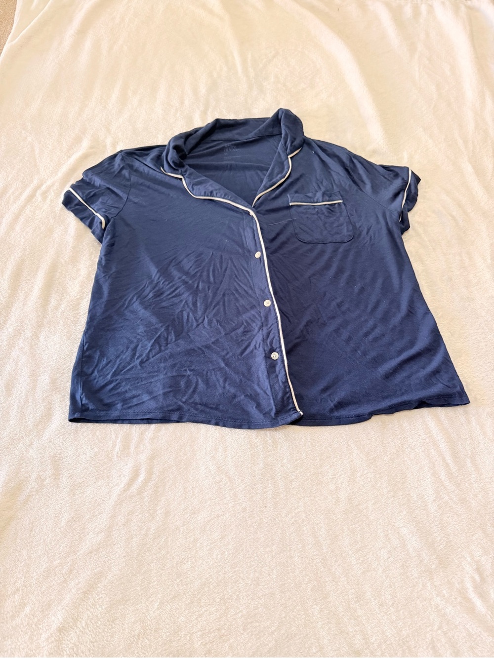 stars above Navy Short Sleeve Button-Up Top with White Piping